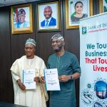 President National Association of Small and Medium Enterprises Dr. Abdulrashid Yarima (left) and Dr. Olasupo Olusi (righr) Managing Director and CEO Bank of Industry after signing a Memorandum of Understanding between NASME and BOI on October 15, 2024 in Abuja